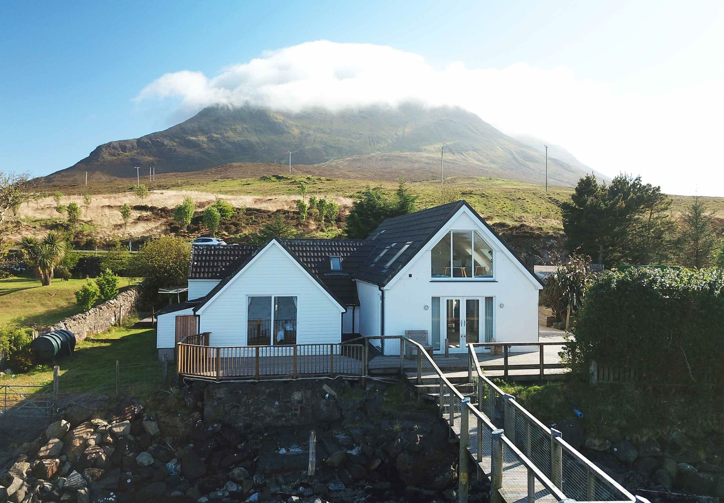 Our luxury self catering accommodation is nestled by the sea and has an outside seating area